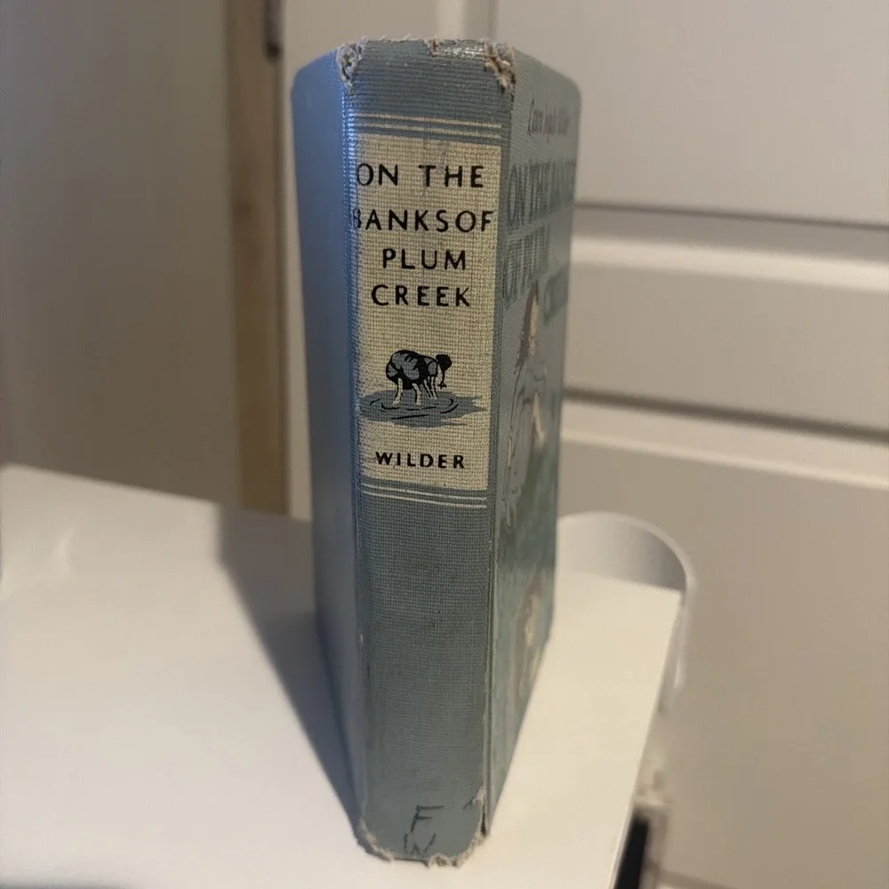 On The Banks Of Plum Creek By Laura Ingalls Wilder RARE Blue‎ Hardcover 1953